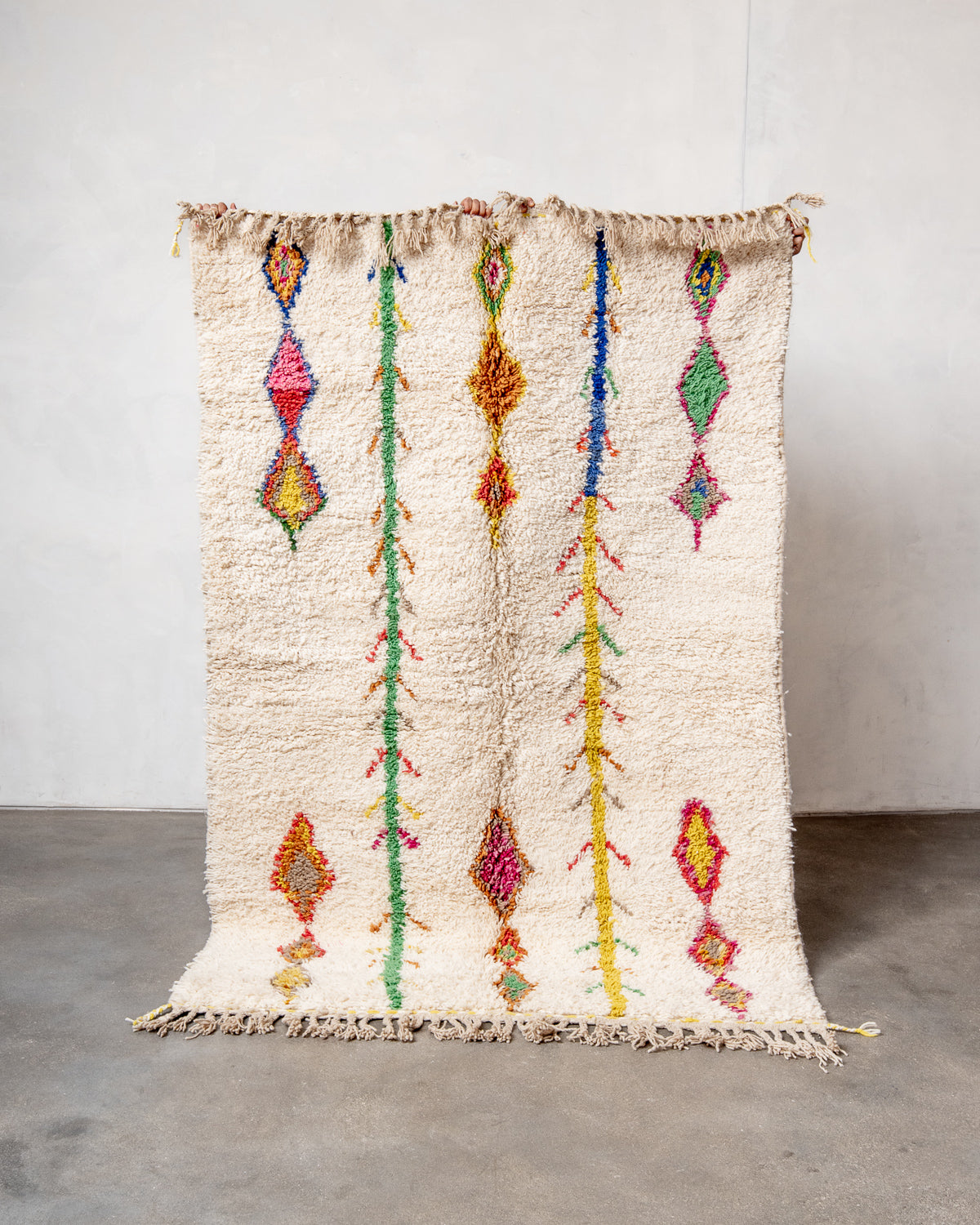 Modern, designer, handcrafted Berber runner rug from Morocco. Beniourain carpet with beautiful colours and patterns and fluffy wool texture.